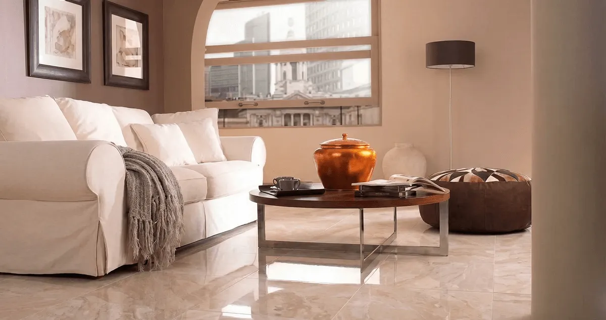 Modern living room with professionally installed marble flooring, a beige sofa, coffee table in Stockton, CA